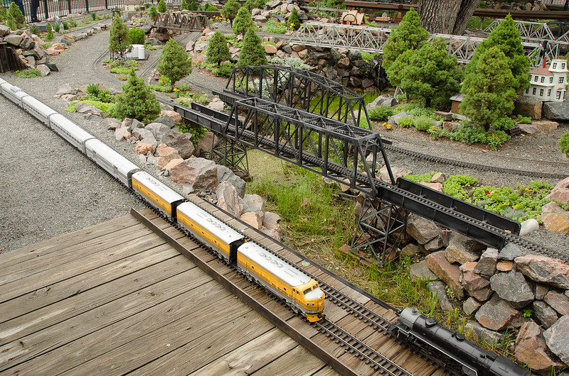 photo of model trains in garden